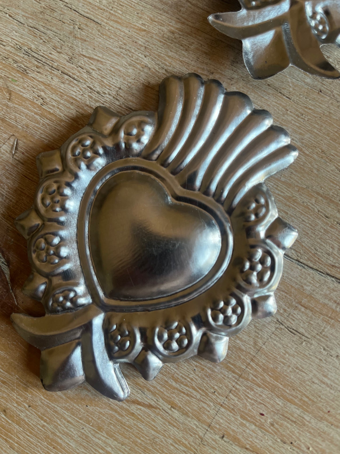 Tin Sacred Hearts