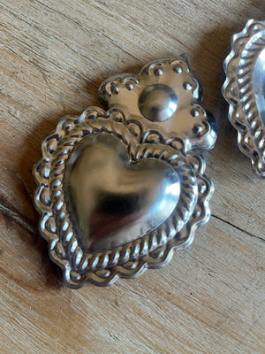 Tin Sacred Hearts